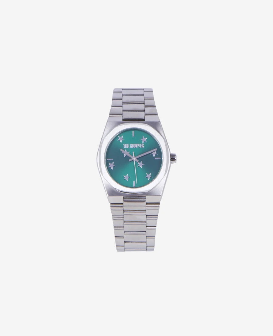 Montre stars argent sur fond vert